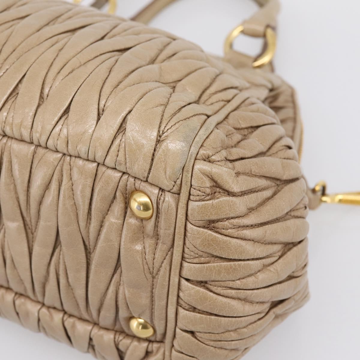 Miu Miu Convertible Dome Satchel Matelasse Leather Beige Leather Handbag (Pre-Owned)