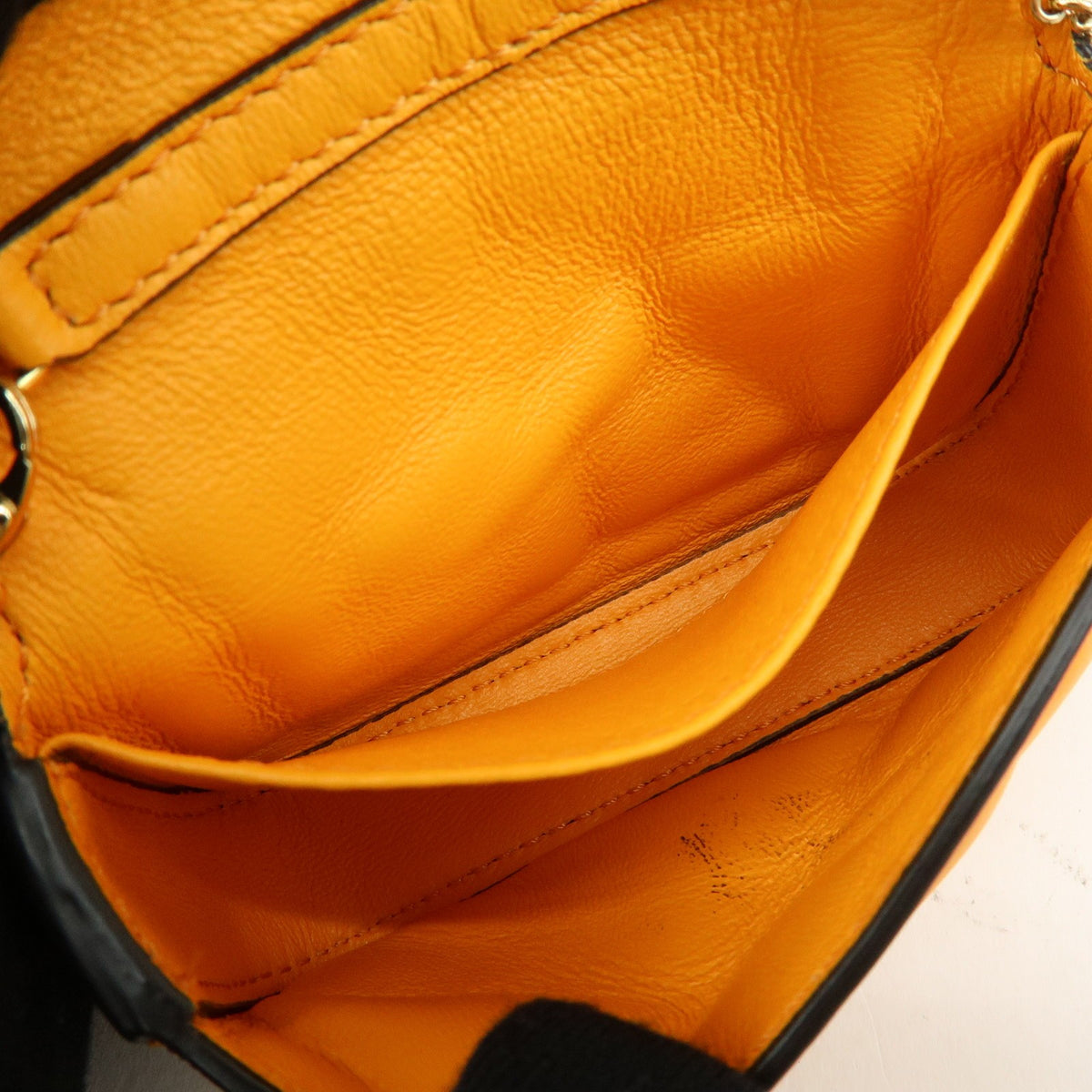 Fendi Chain Baguette Charm Zucca Embossed Leather Orange Leather Handbag (Pre-Owned)