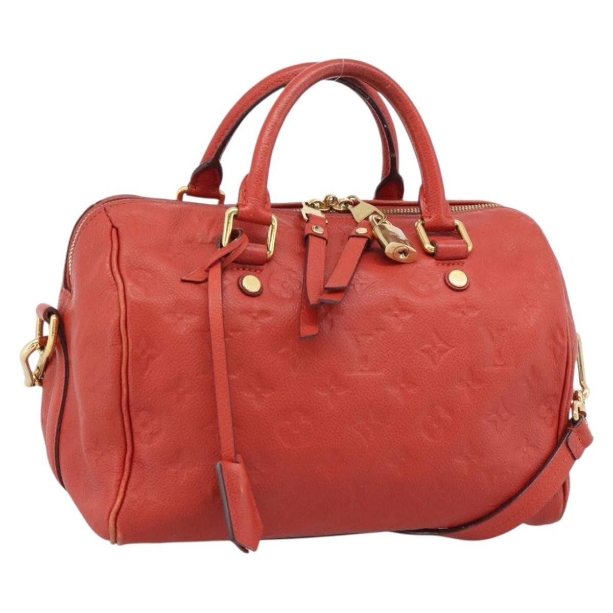 Louis Vuitton Speedy Bandouliere Monogram Empreinte Leather Red Leather Handbag (Pre-Owned)