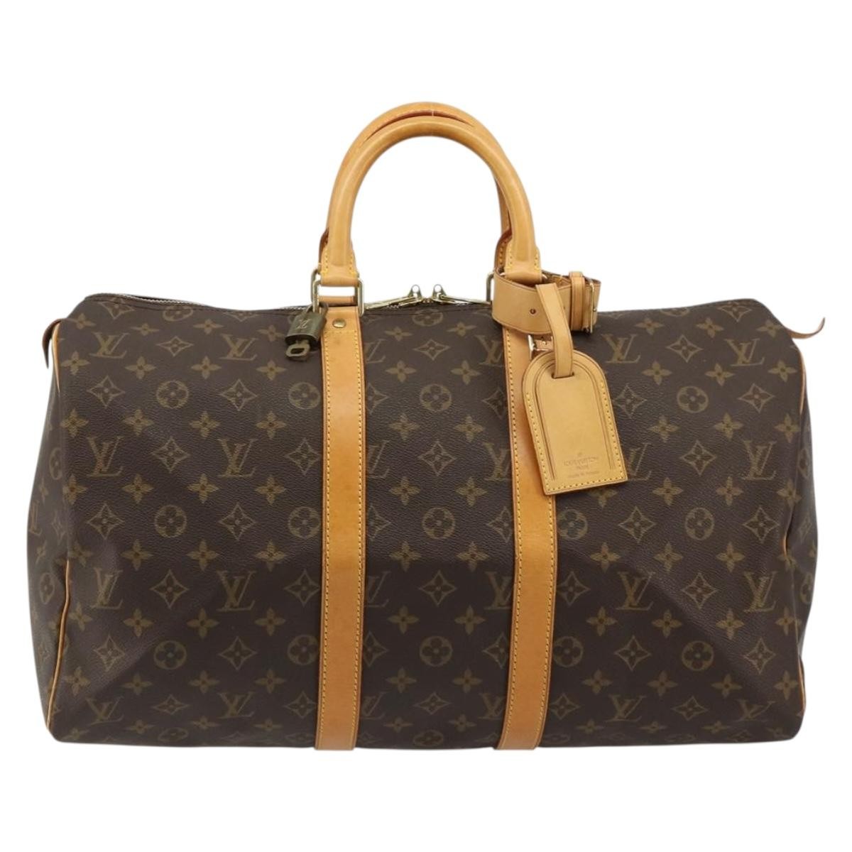Louis Vuitton Keepall Monogram Canvas Brown Canvas Travel Bag Bag (Pre-Owned)