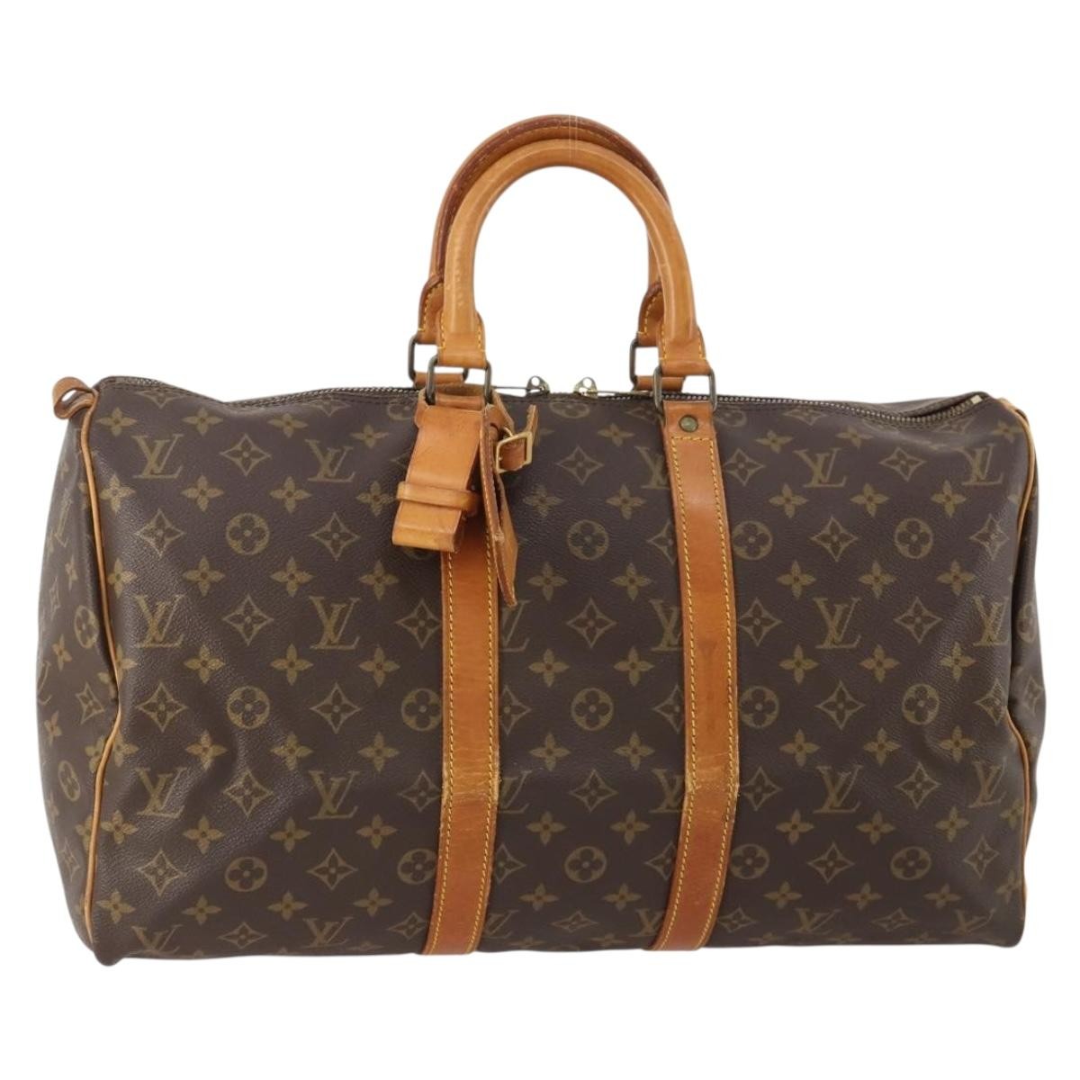 Louis Vuitton Keepall Monogram Canvas Brown Canvas Handbag (Pre-Owned)