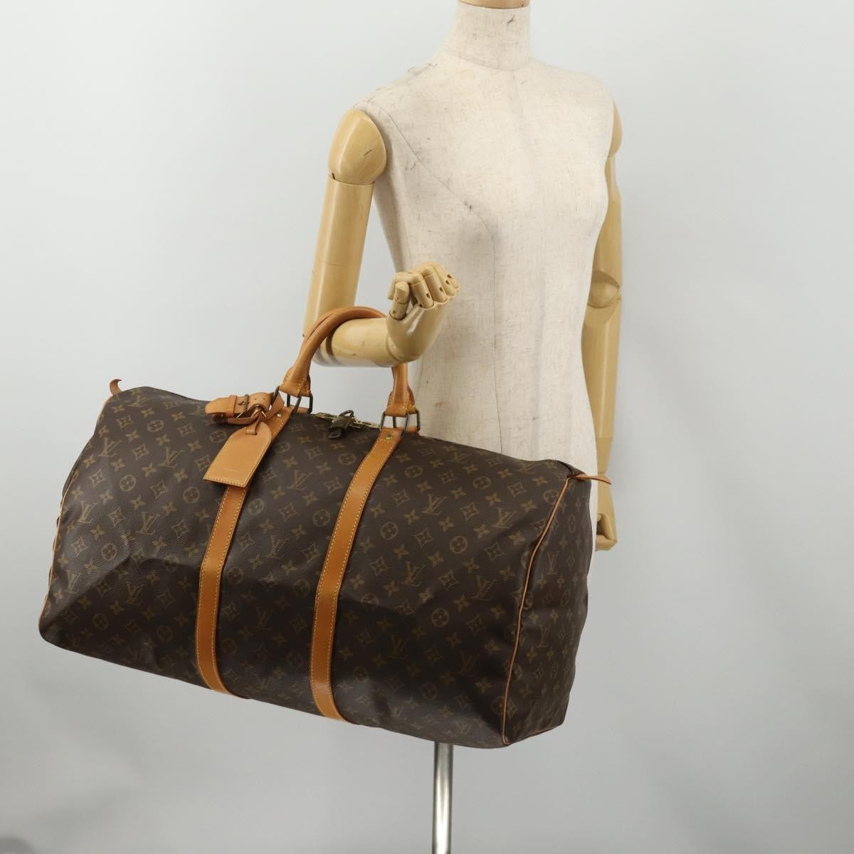 Louis Vuitton Keepall Monogram Canvas Brown Canvas Travel Bag Bag (Pre-Owned)