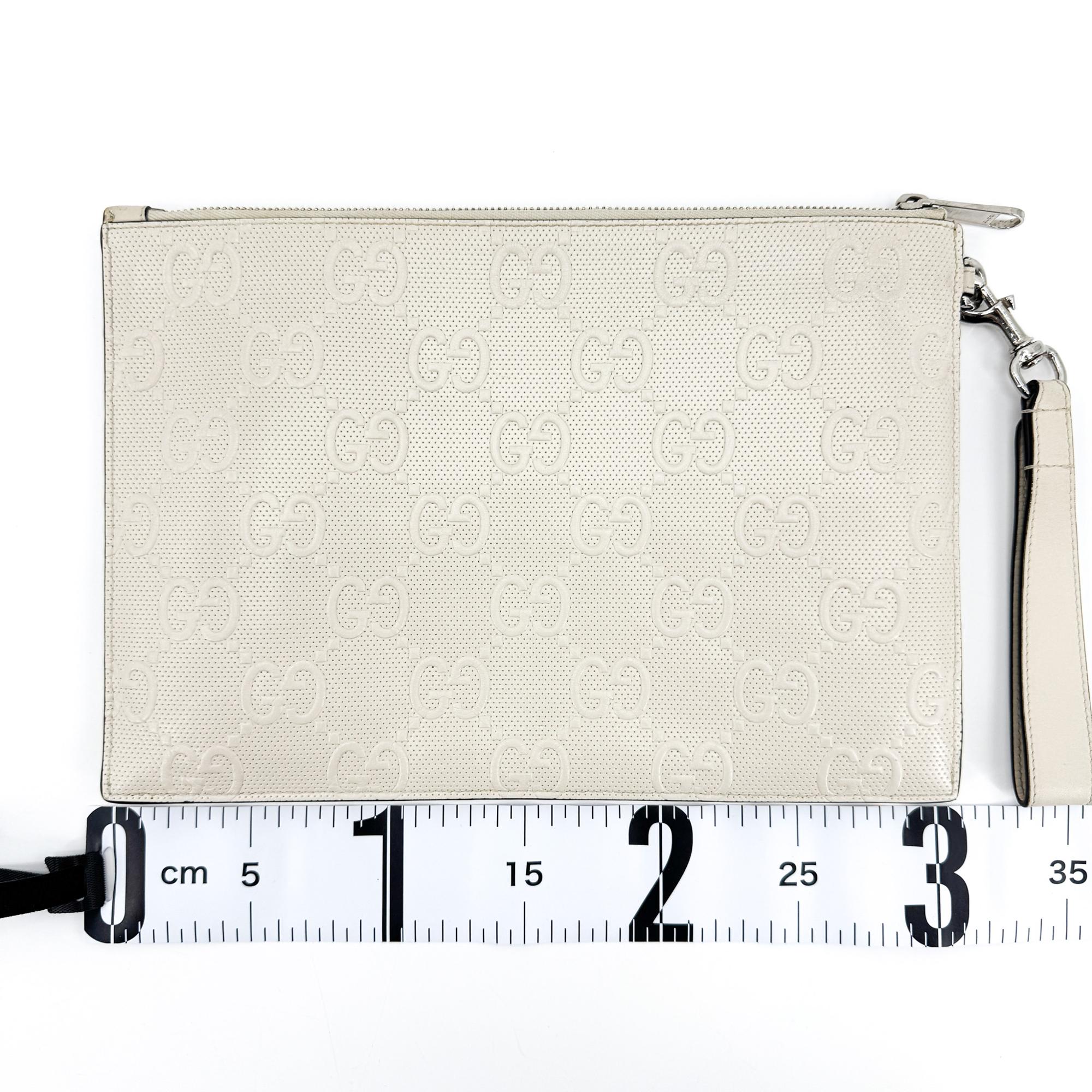 Gucci Wristlet Gg Embossed Perforated Leather White Leather Clutche & Pouche Bag (Pre-Owned)