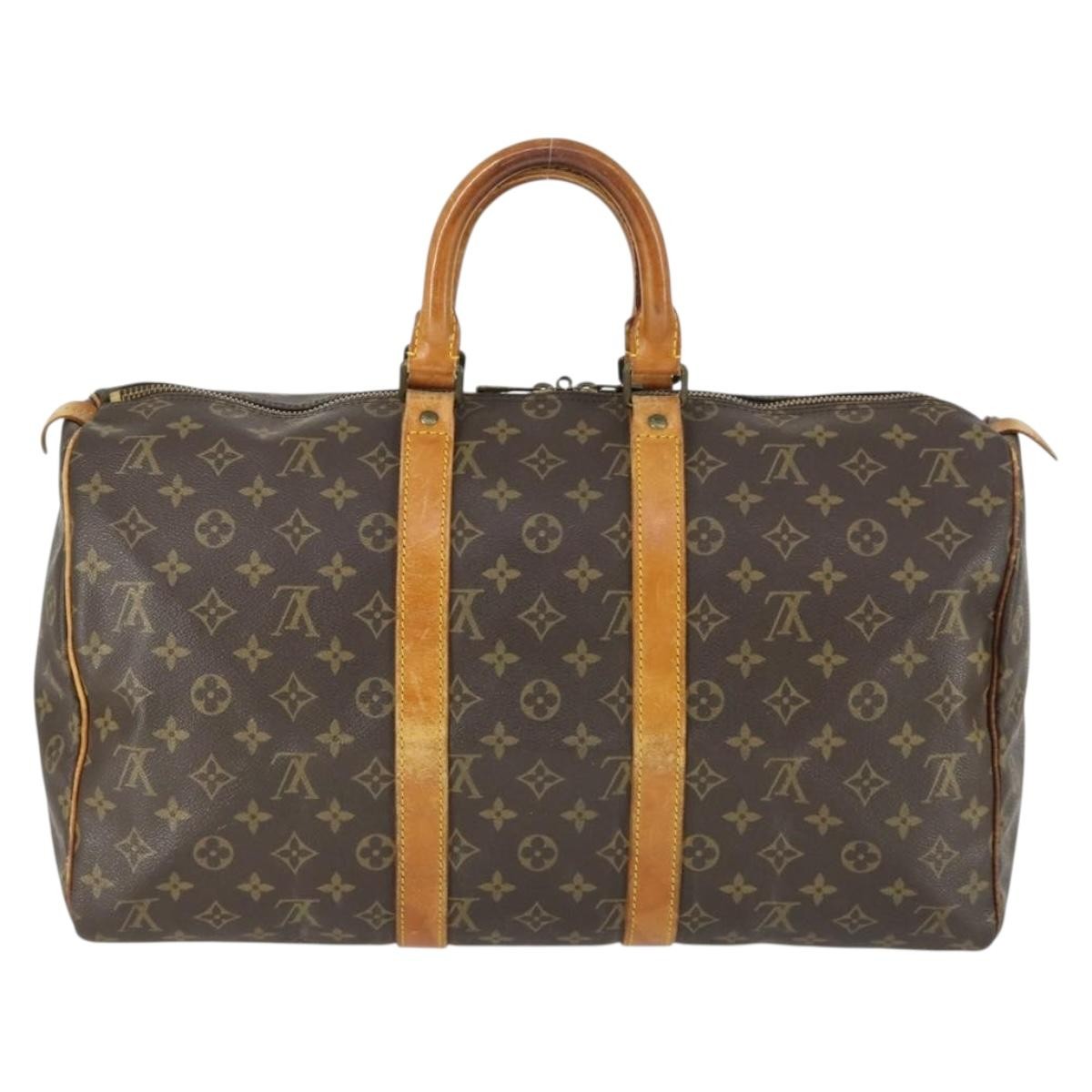 Louis Vuitton Keepall Monogram Canvas Brown Canvas Travel Bag Bag (Pre-Owned)
