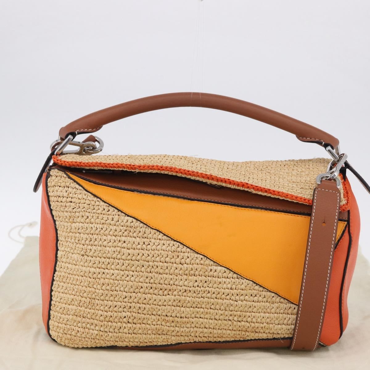 Loewe Puzzle Leather And Raffia Beige Leather Handbag (Pre-Owned)