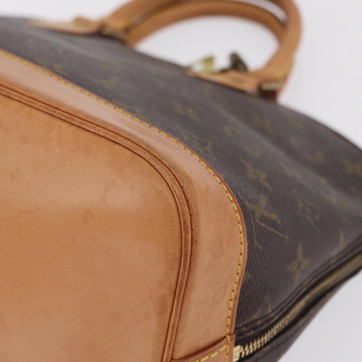 Louis Vuitton Alma Monogram Canvas Brown Canvas Handbag (Pre-Owned)