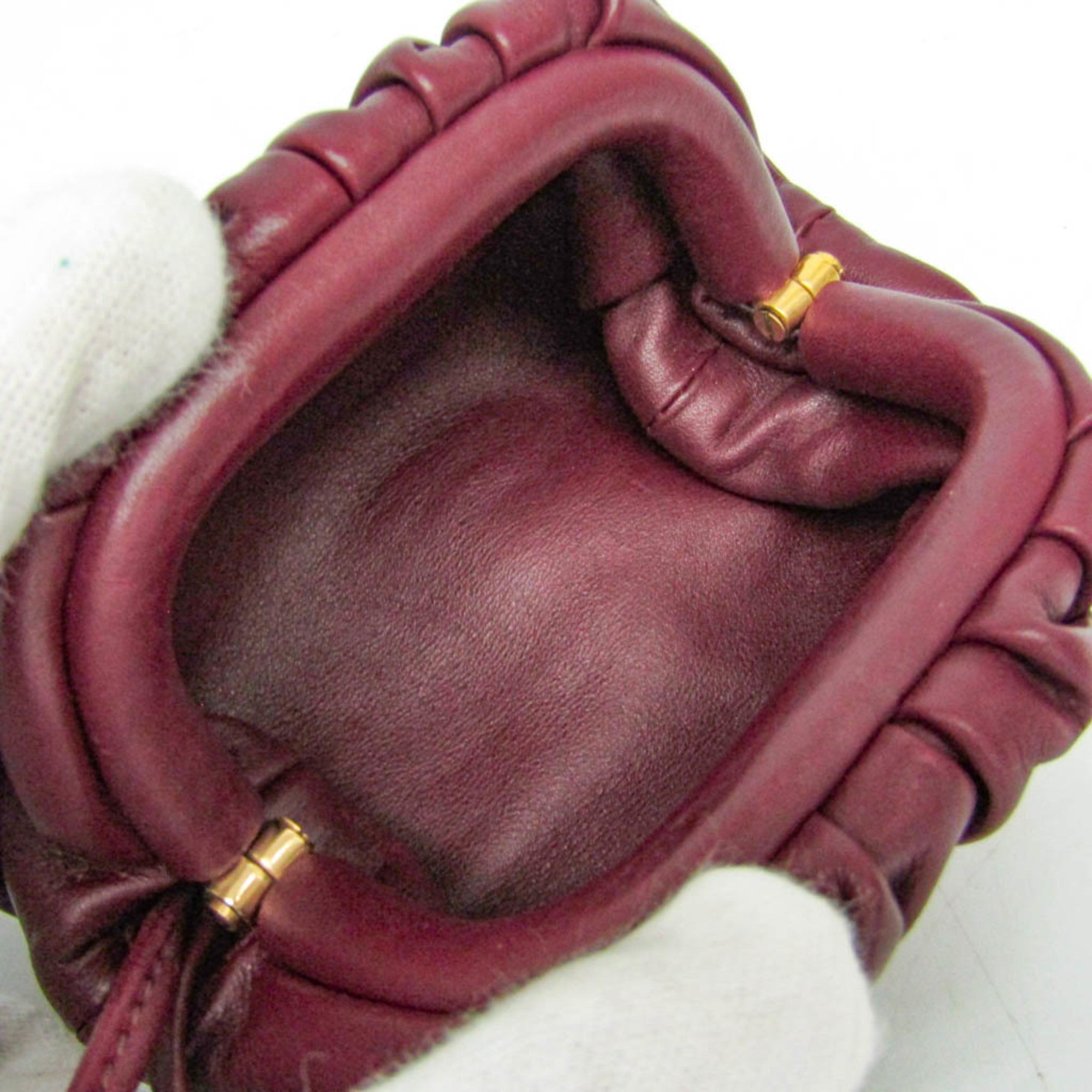 Bottega Veneta The Leather Burgundy Leather Clutche & Pouche Bag (Pre-Owned)