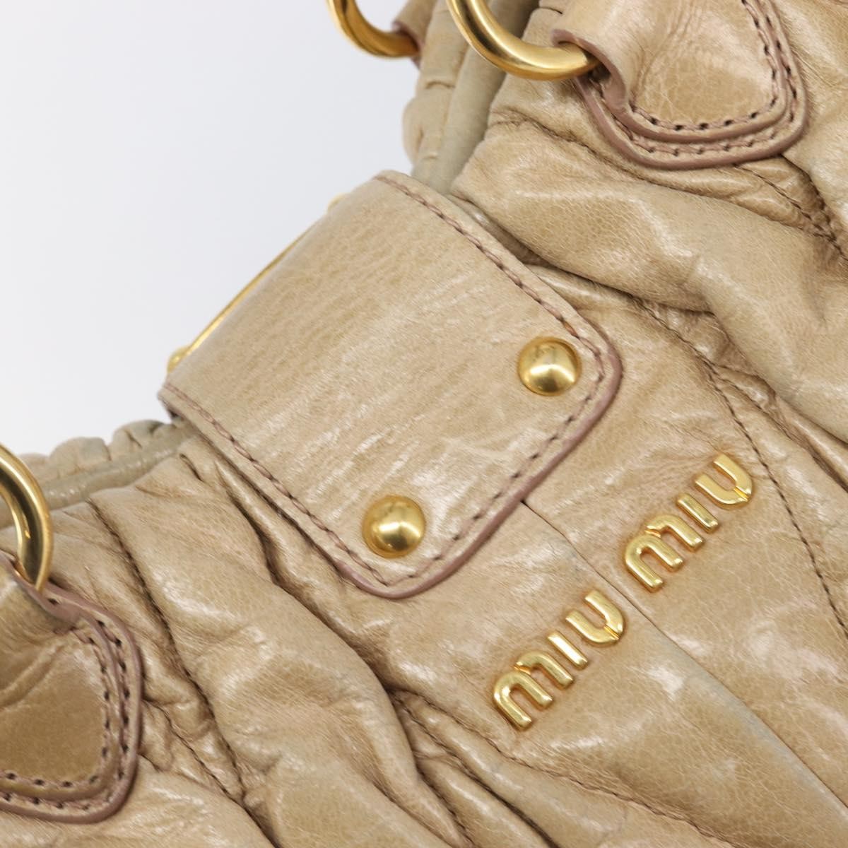 Miu Miu Coffer Convertible Satchel Matelasse Leather Beige Leather Handbag (Pre-Owned)