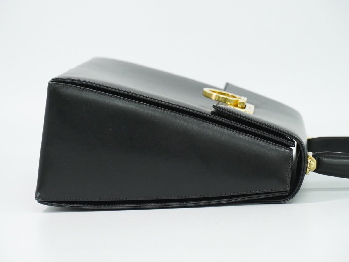 Salvatore Ferragamo Convertible Top Handle Leather Black Leather Handbag (Pre-Owned)