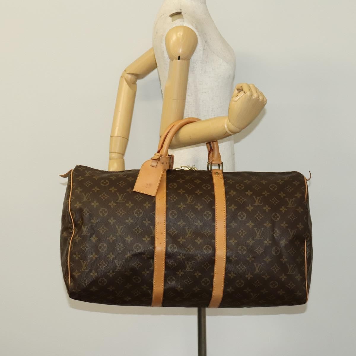 Louis Vuitton Keepall Monogram Canvas Brown Canvas Travel Bag Bag (Pre-Owned)