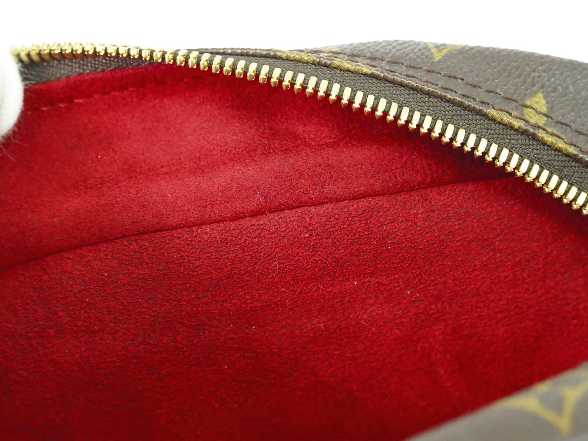 Louis Vuitton Excentri-Cite Monogram Canvas Brown Canvas Handbag (Pre-Owned)