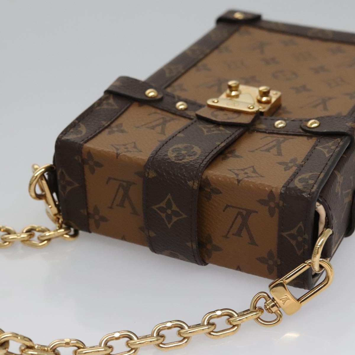 Louis Vuitton Vertical Trunk Pochette Reverse Monogram Canvas Brown Canvas Clutche & Pouche Bag (Pre-Owned)