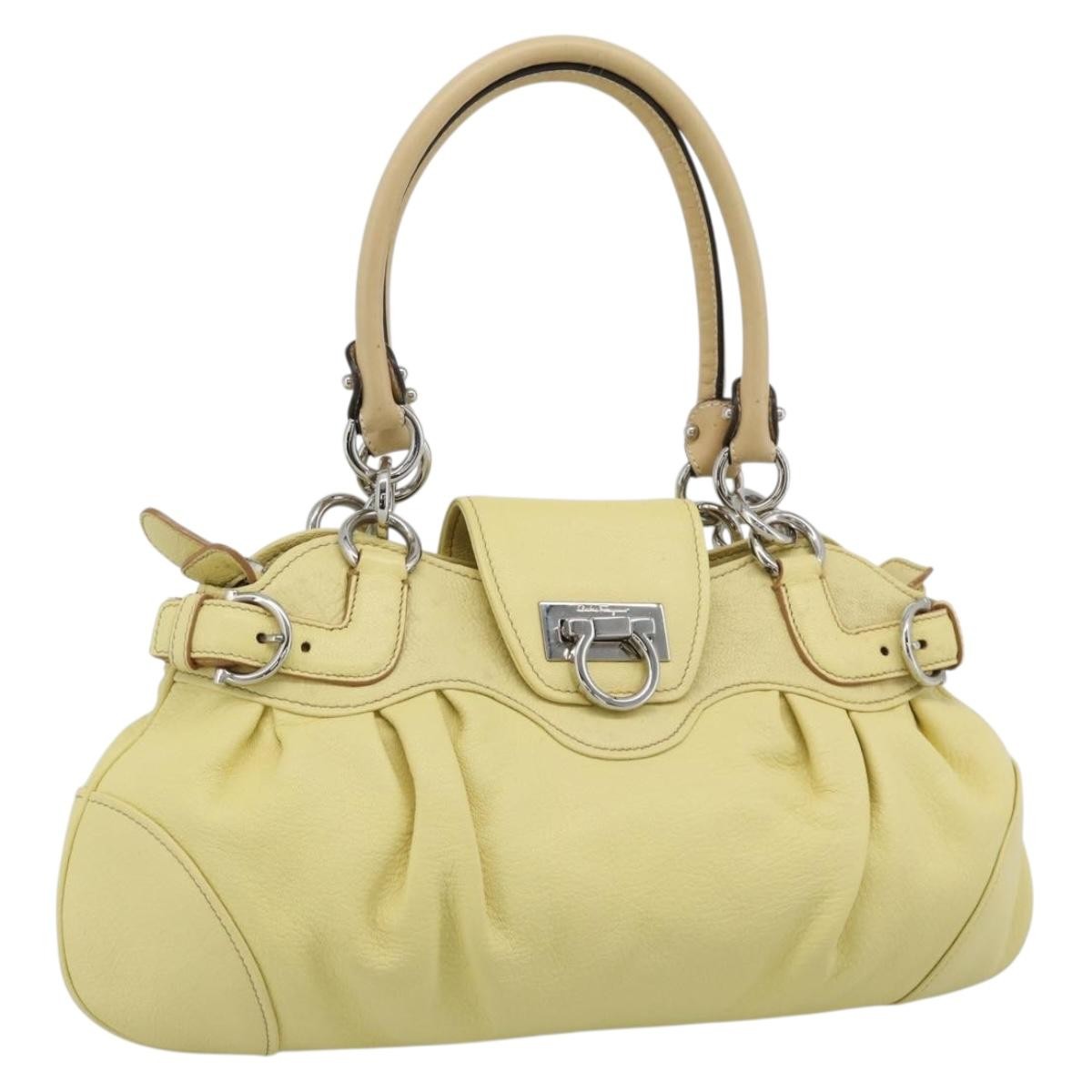 Salvatore Ferragamo Gancini Leather Yellow Leather Handbag (Pre-Owned)