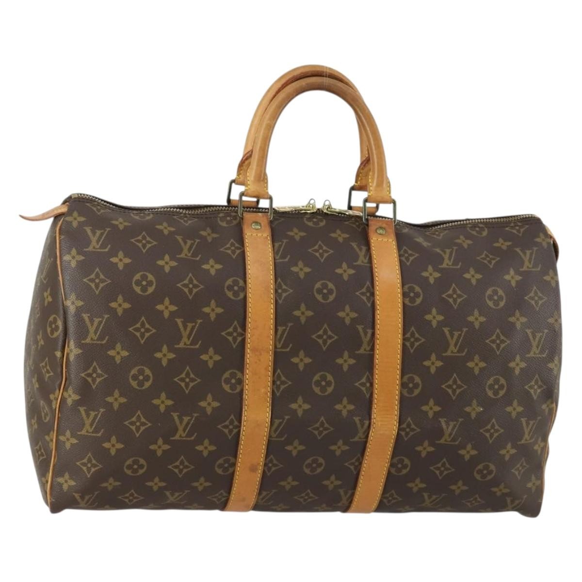 Louis Vuitton Keepall Monogram Canvas Brown Canvas Travel Bag Bag (Pre-Owned)