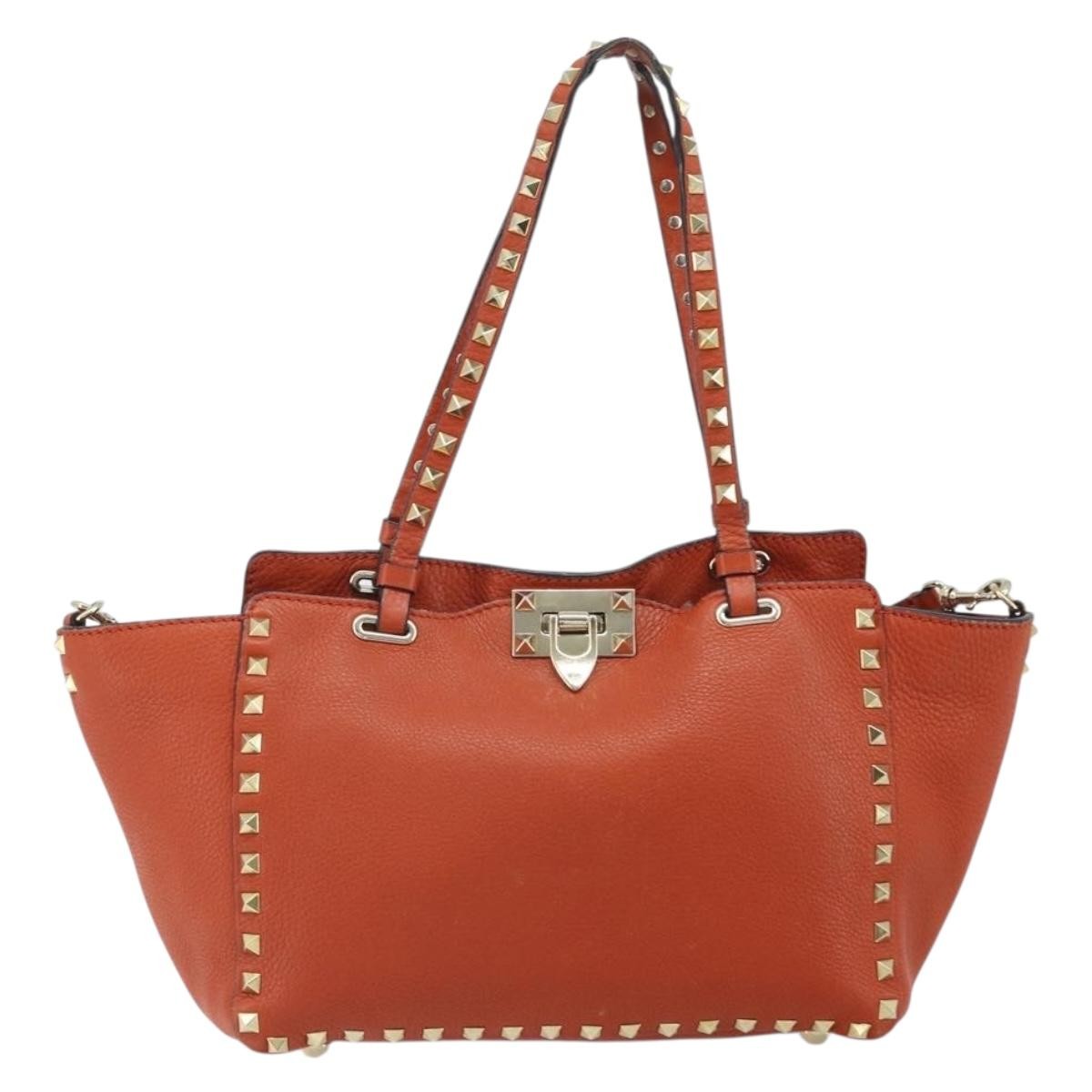 Valentino Garavani 1975 Rockstud Striped Leather Orange Leather Tote Bag Bag (Pre-Owned)