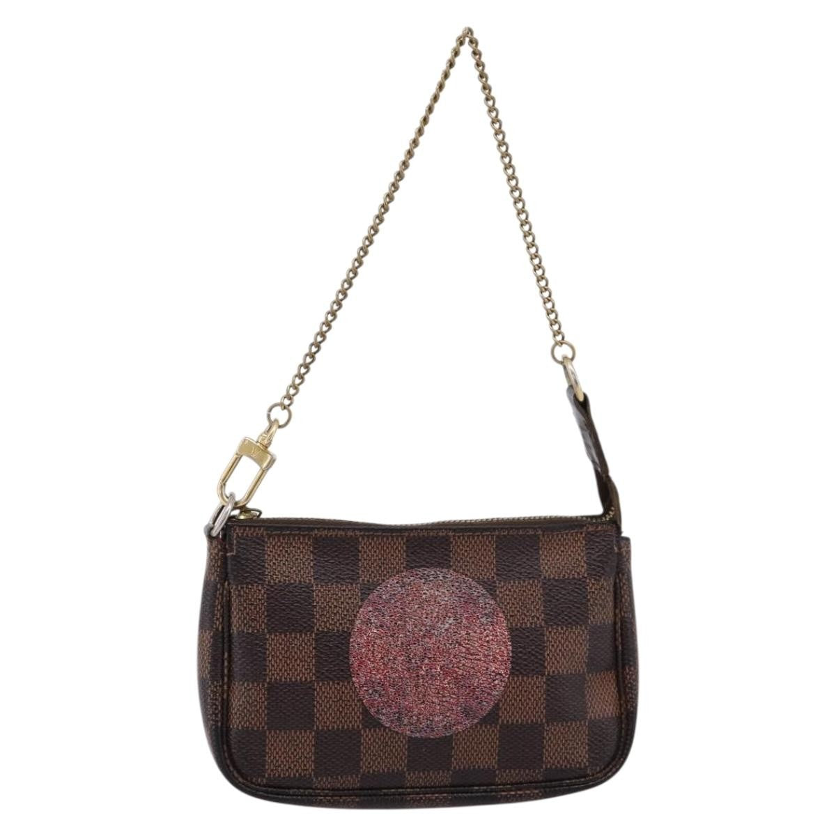 Louis Vuitton Mini Pochette Accessoires Damier Canvas Brown Canvas Clutche & Pouche Bag (Pre-Owned)