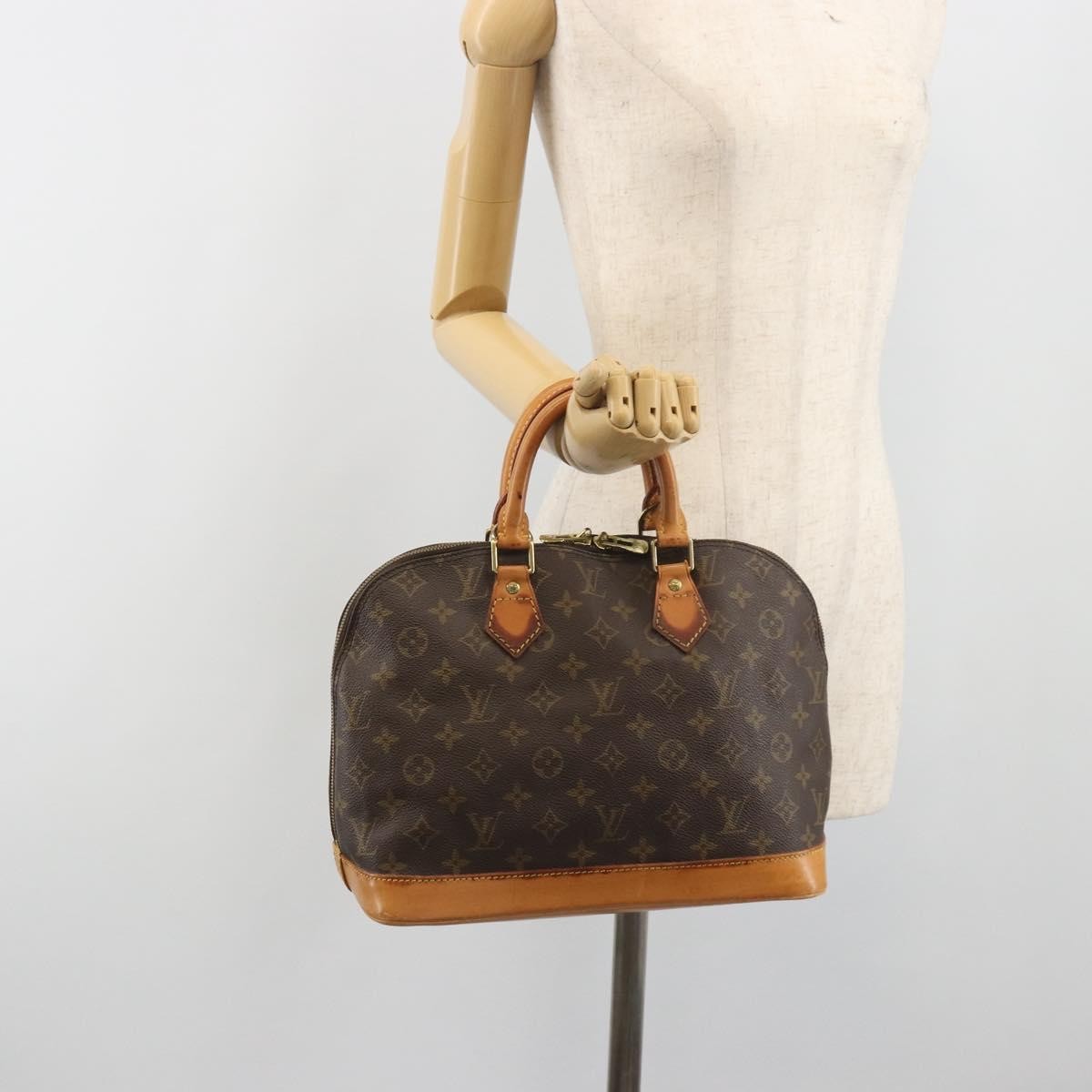 Louis Vuitton Alma Monogram Brown Canvas Handbag (Pre-Owned)