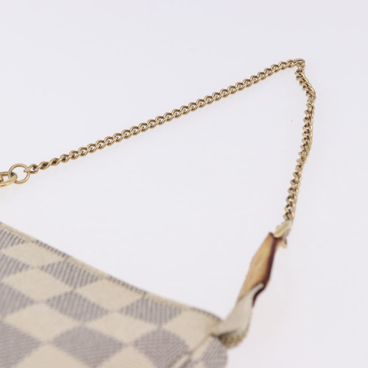 Louis Vuitton Mini Pochette Accessoires Damier Canvas Beige Canvas Clutche & Pouche Bag (Pre-Owned)