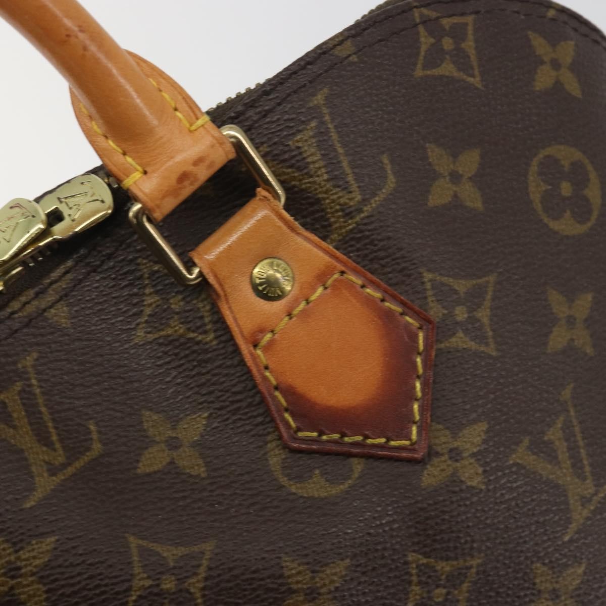 Louis Vuitton Alma Monogram Brown Canvas Handbag (Pre-Owned)