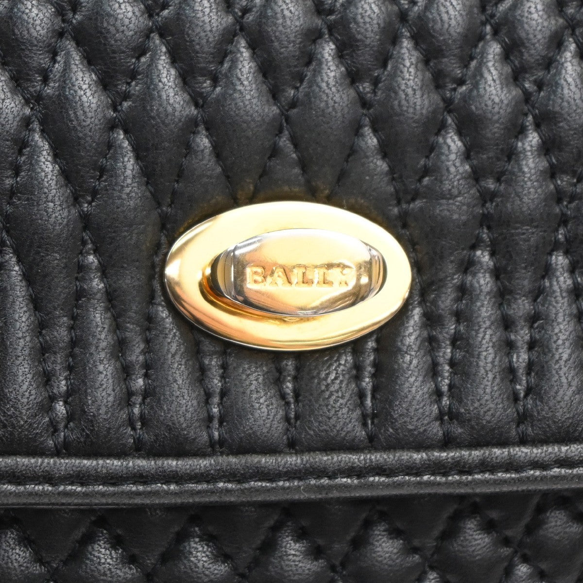 Bally Vintage Quilted Leather Black Leather Handbag (Pre-Owned)