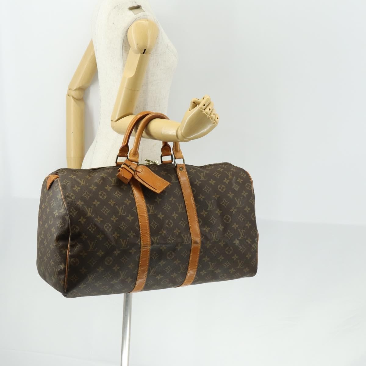 Louis Vuitton Keepall Monogram Canvas Brown Canvas Travel Bag Bag (Pre-Owned)