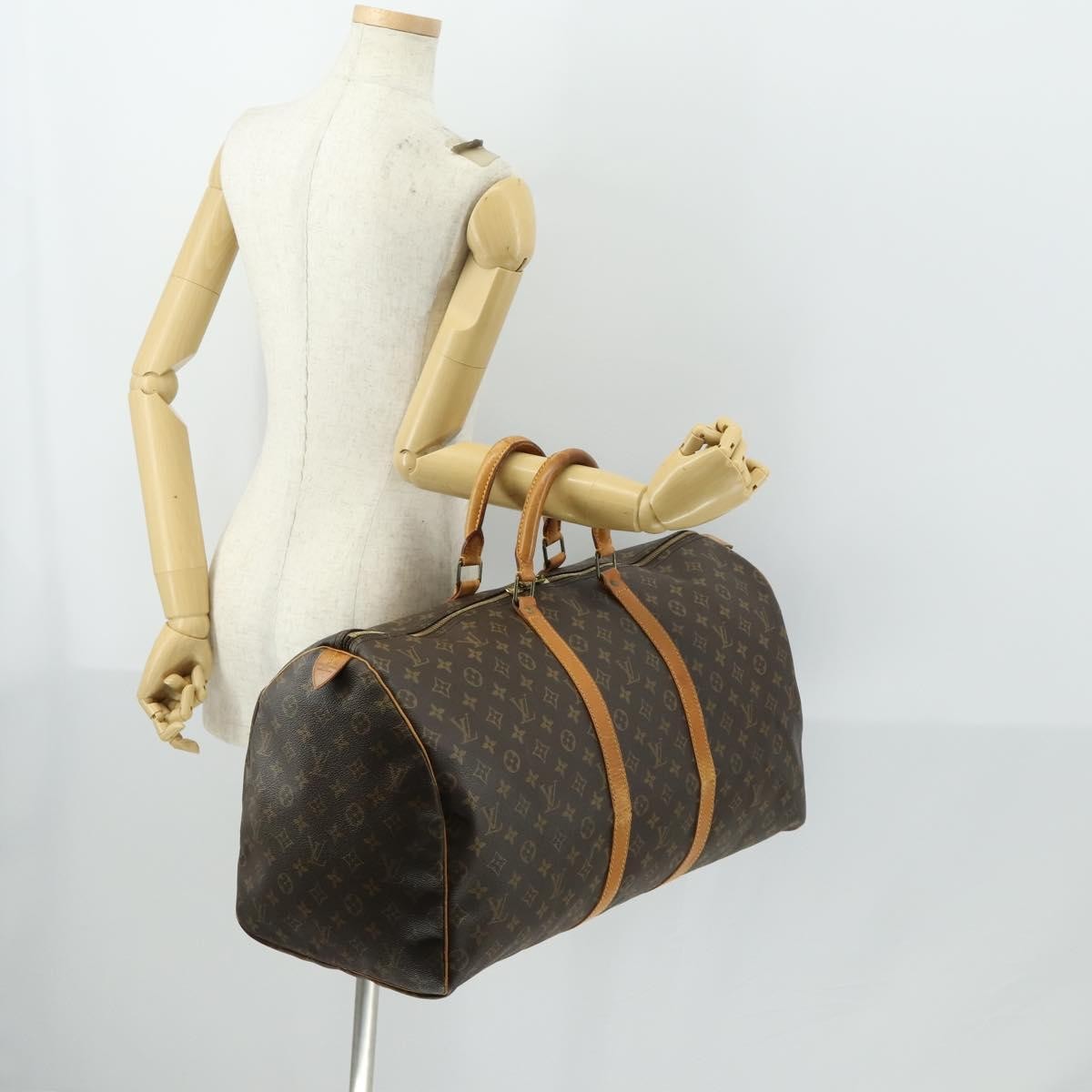 Louis Vuitton Keepall Monogram Canvas Brown Canvas Travel Bag Bag (Pre-Owned)