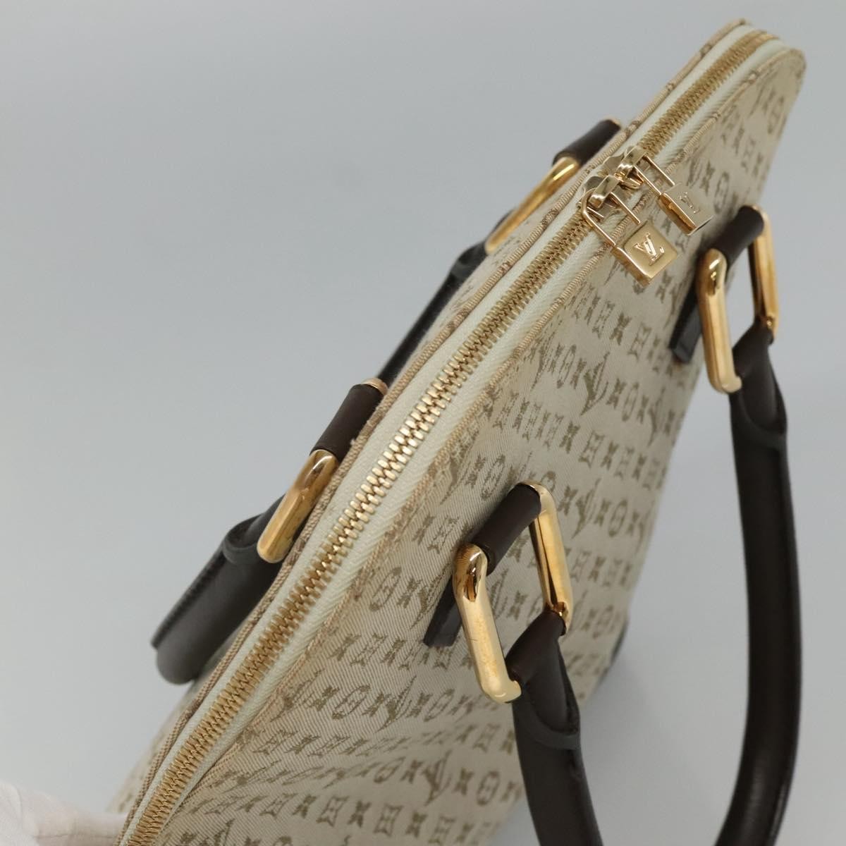 Louis Vuitton Alma Mini Lin Monogram Khaki Canvas Handbag (Pre-Owned)
