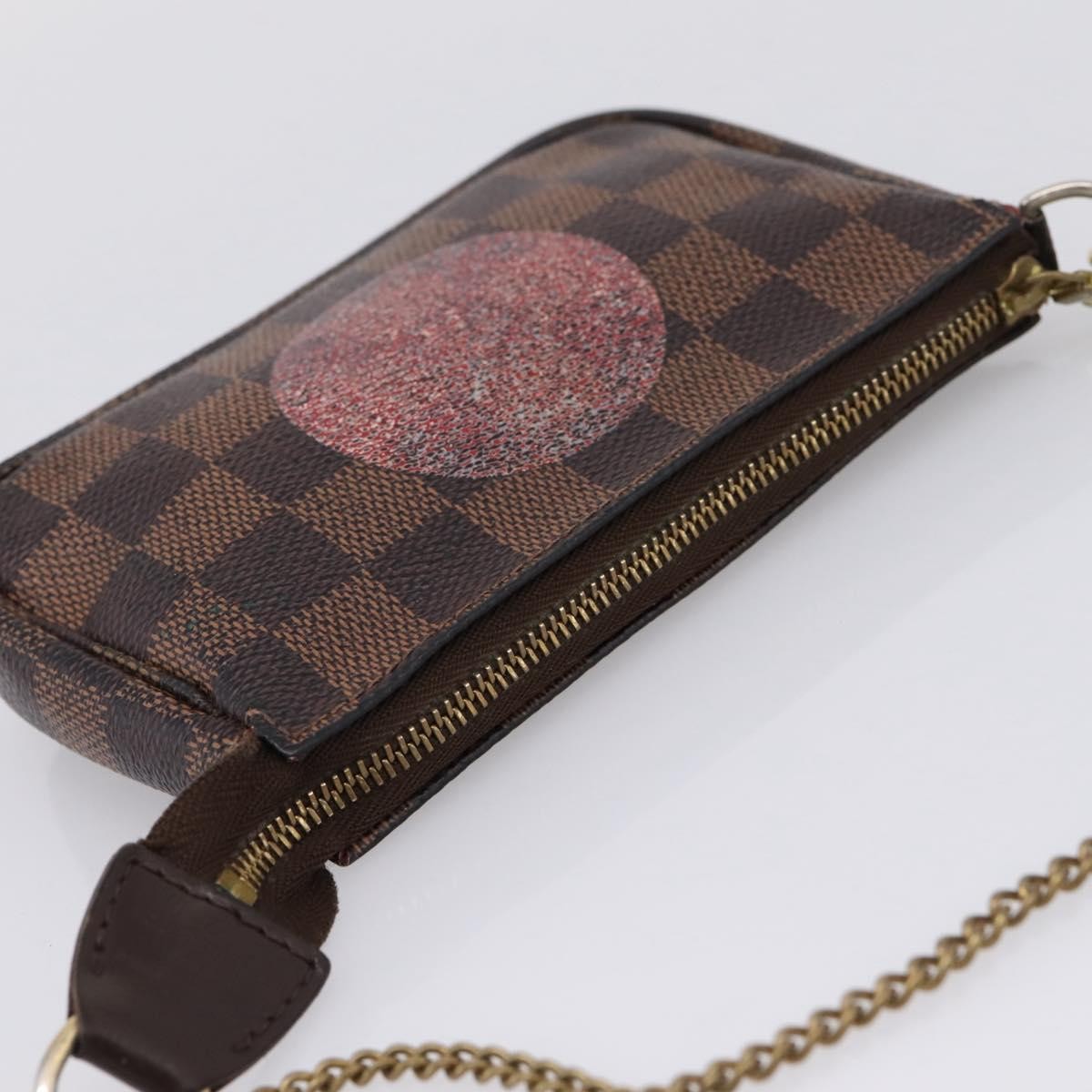 Louis Vuitton Mini Pochette Accessoires Damier Canvas Brown Canvas Clutche & Pouche Bag (Pre-Owned)