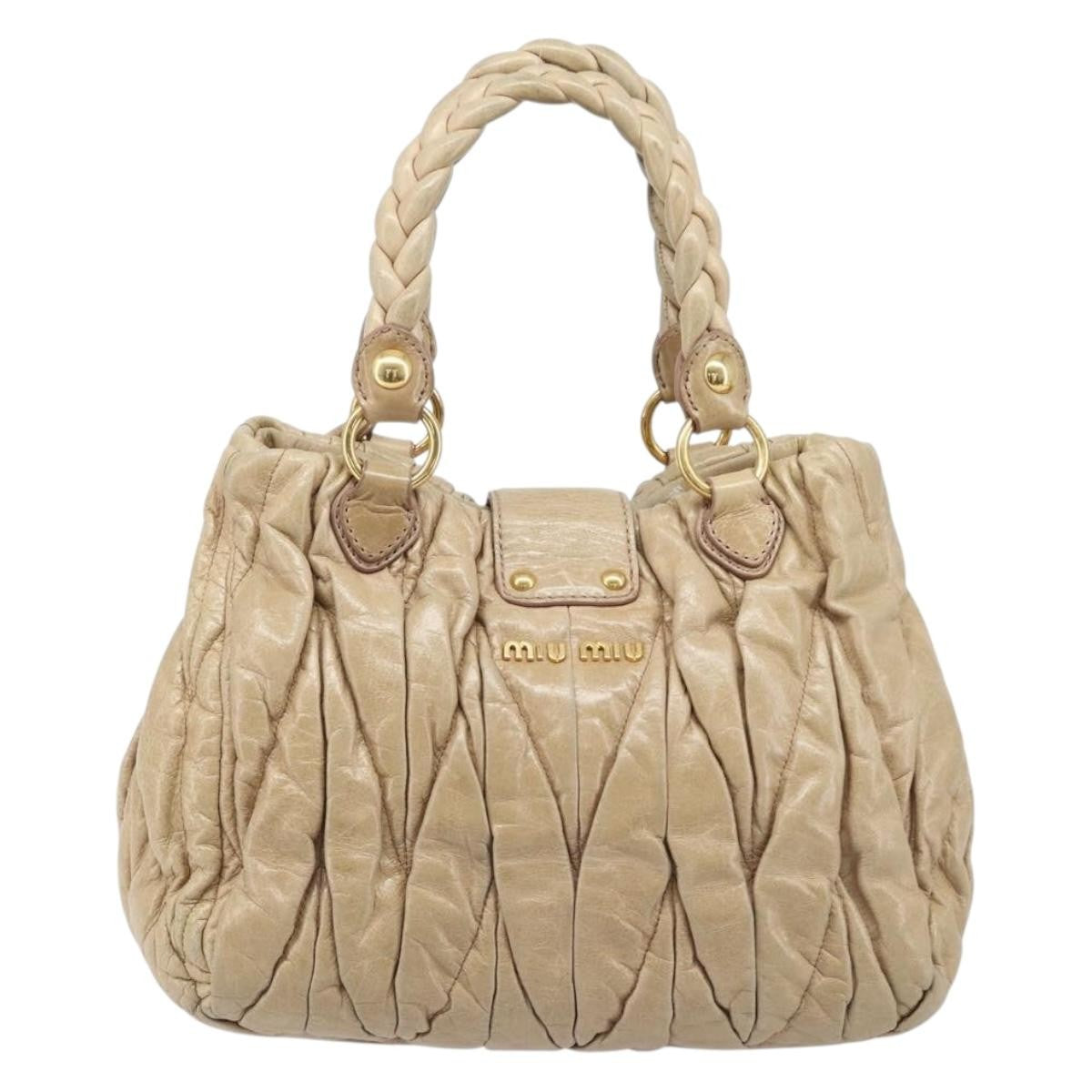 Miu Miu Coffer Convertible Satchel Matelasse Leather Beige Leather Handbag (Pre-Owned)