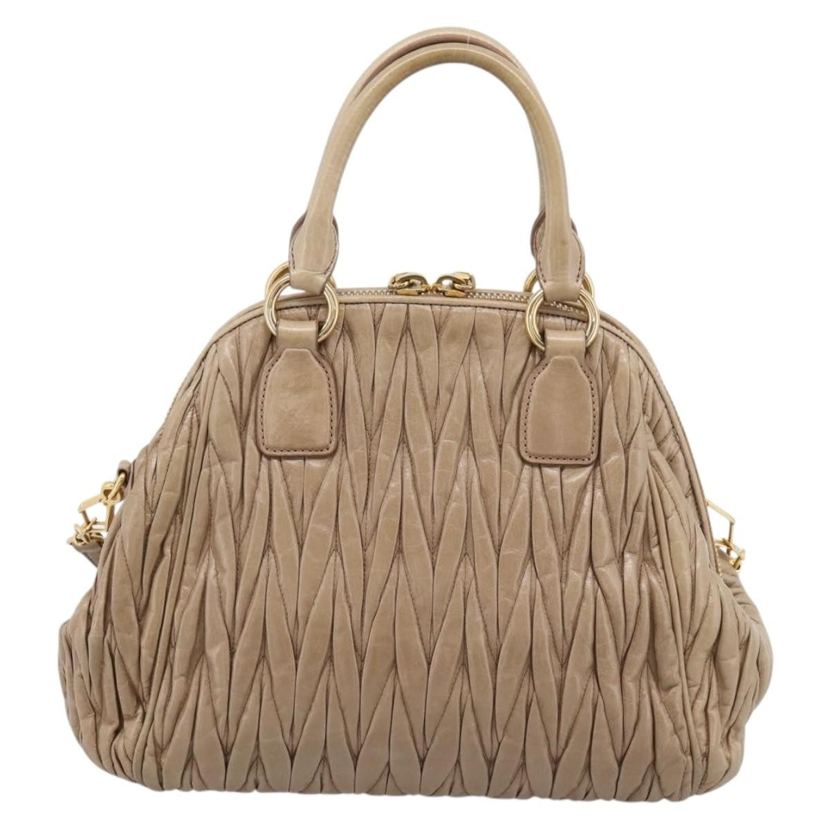 Miu Miu Convertible Dome Satchel Matelasse Leather Beige Leather Handbag (Pre-Owned)