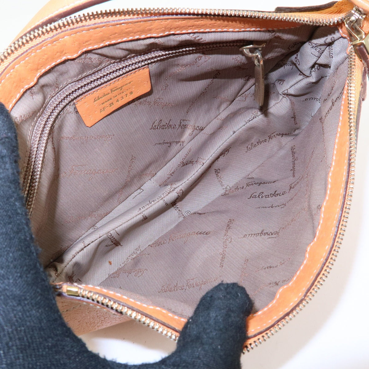 Salvatore Ferragamo Gancini Top Handle Leather Orange Leather Handbag (Pre-Owned)