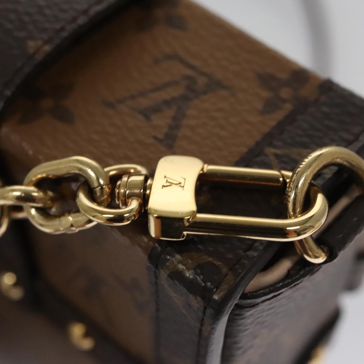 Louis Vuitton Vertical Trunk Pochette Reverse Monogram Canvas Brown Canvas Clutche & Pouche Bag (Pre-Owned)