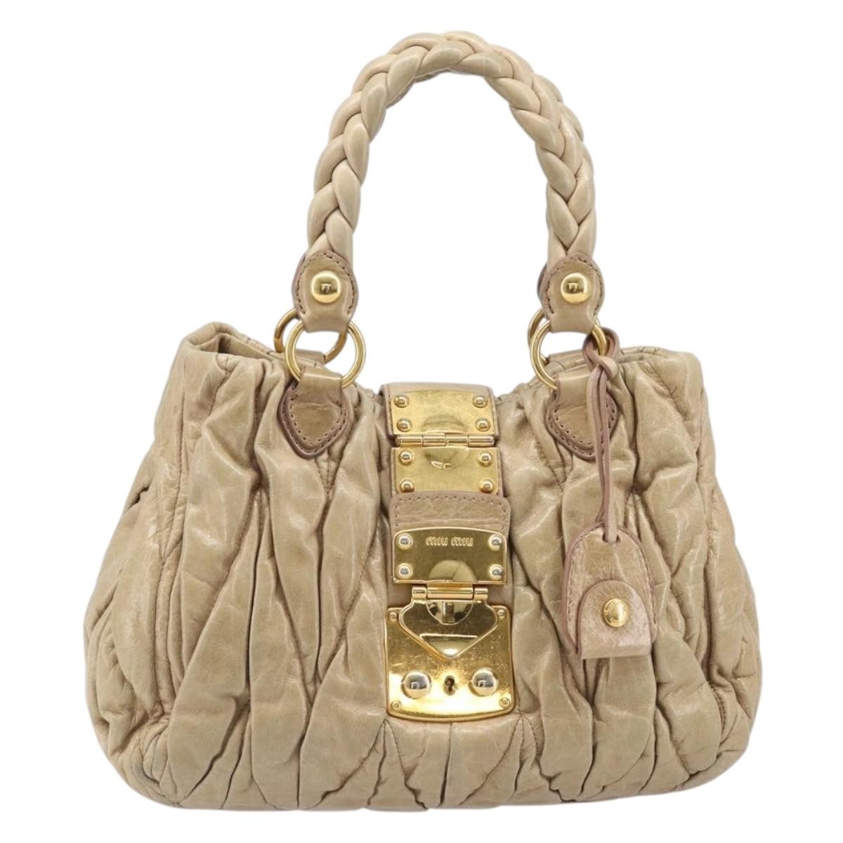 Miu Miu Coffer Convertible Satchel Matelasse Leather Beige Leather Handbag (Pre-Owned)