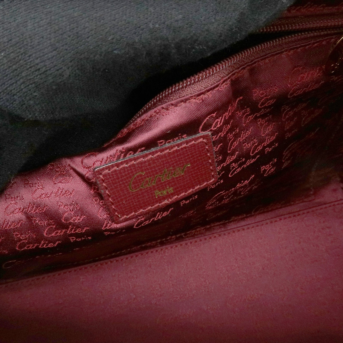 Cartier Must De Cartier Boston Leather Burgundy Leather Travel Bag Bag (Pre-Owned)