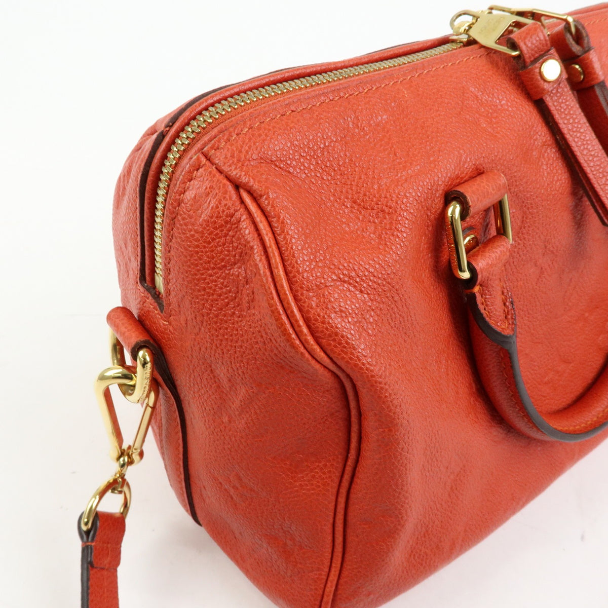 Louis Vuitton Speedy Bandouliere Monogram Empreinte Leather Orange Leather Handbag (Pre-Owned)