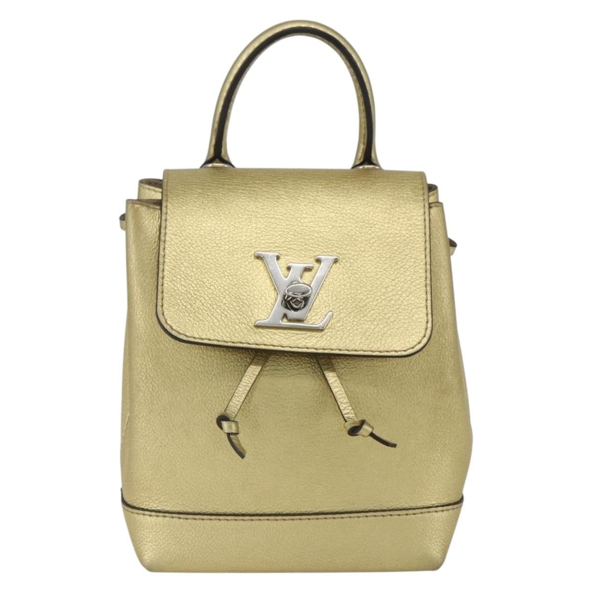 Louis Vuitton Lockme Leather Gold Leather Backpack Bag (Pre-Owned)
