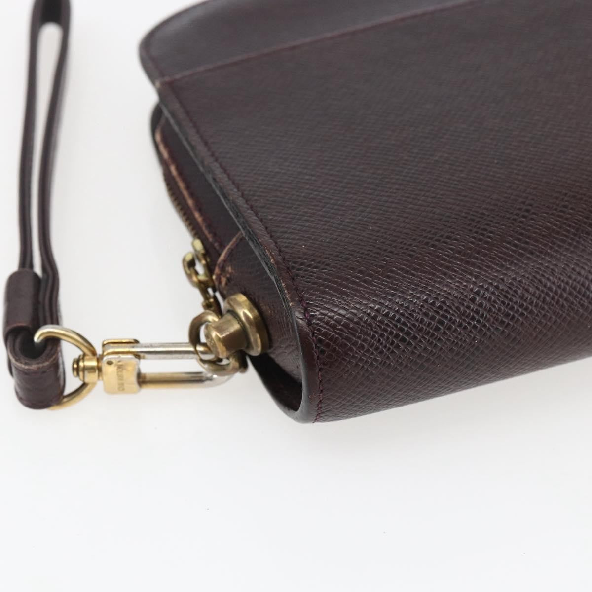 Louis Vuitton Pochette Baikal Clutch Taiga Leather Burgundy Leather Clutche & Pouche Bag (Pre-Owned)