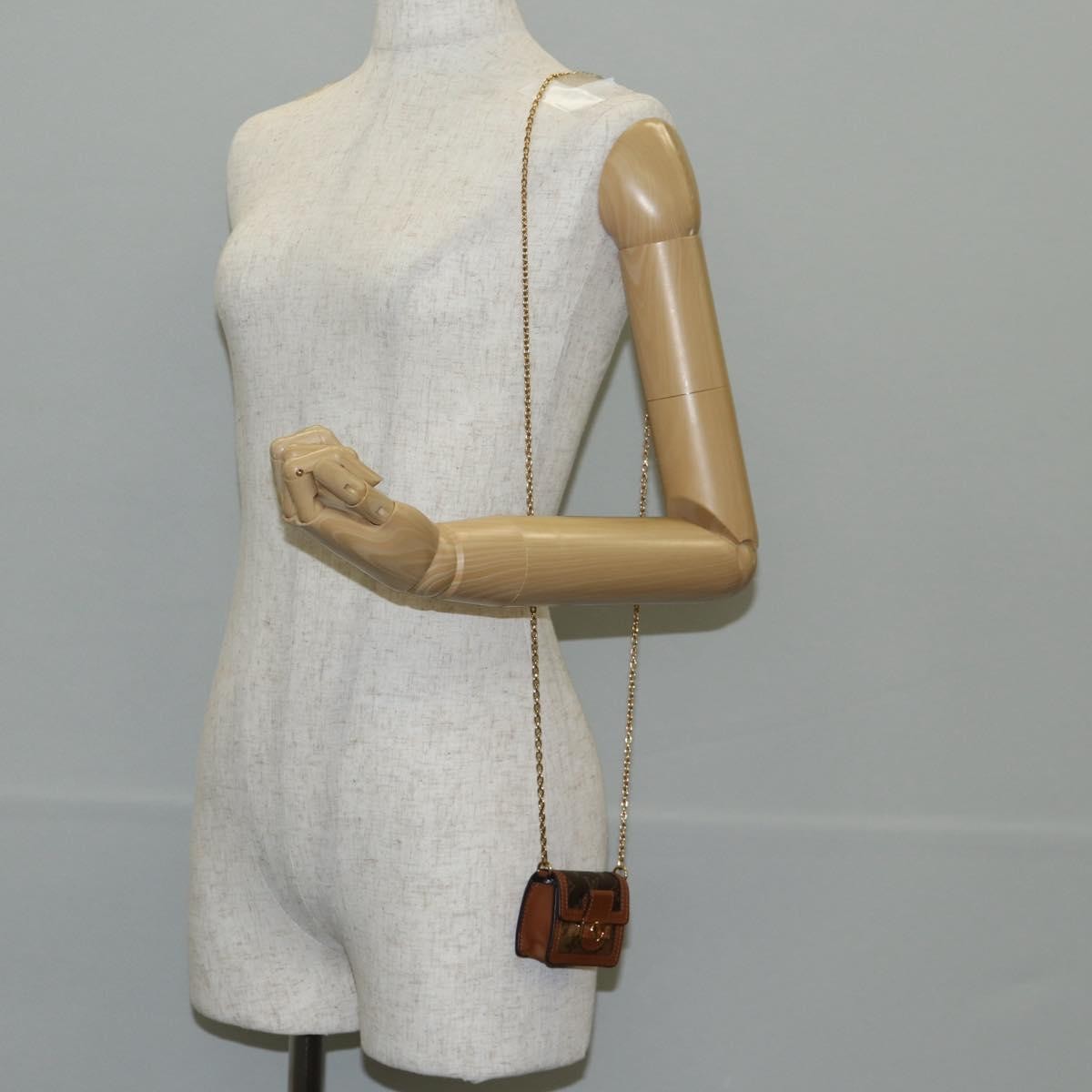 Louis Vuitton Dauphine Chain Wallet Reverse Monogram Canvas Brown Canvas Bag (Pre-Owned)