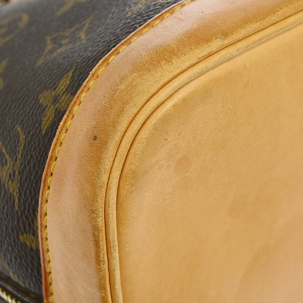 Louis Vuitton Alma Handbag Monogram Canvas Brown Canvas Handbag (Pre-Owned)
