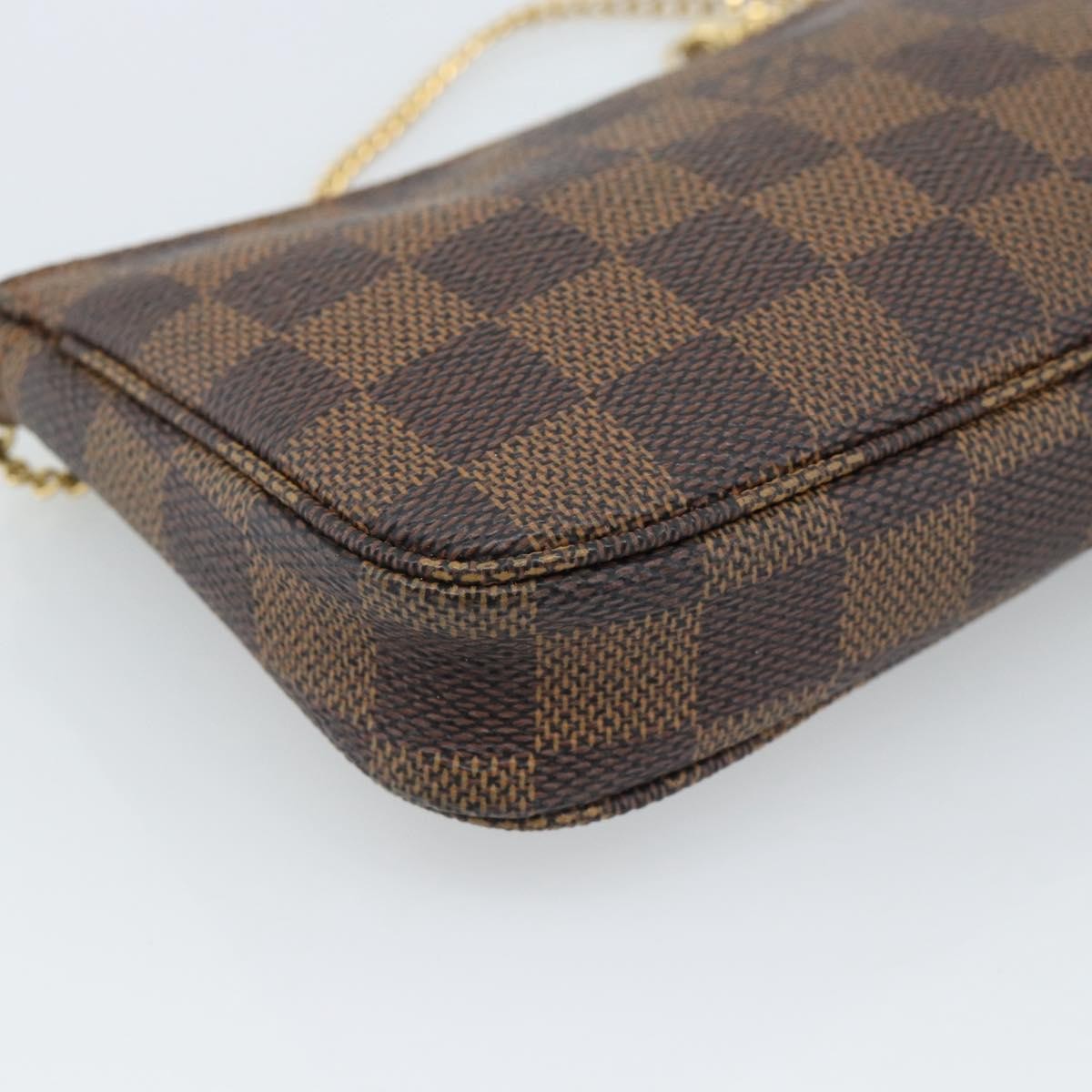 Louis Vuitton Mini Pochette Accessoires Damier Canvas Brown Canvas Clutche & Pouche Bag (Pre-Owned)