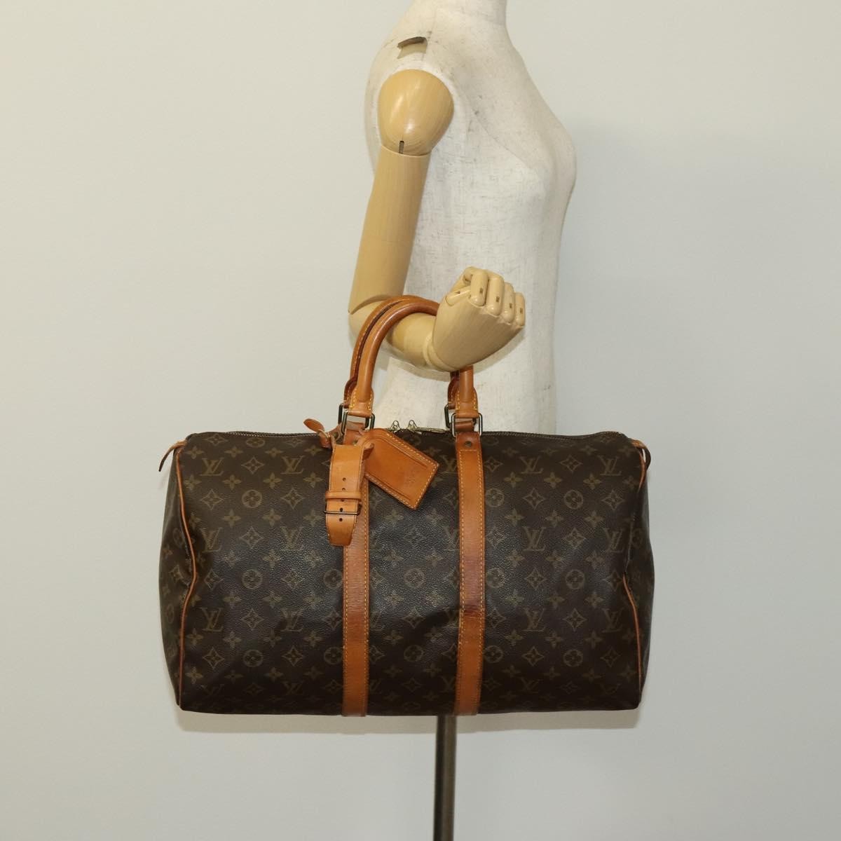 Louis Vuitton Keepall Bag Monogram Canvas Brown Canvas Travel Bag Bag (Pre-Owned)