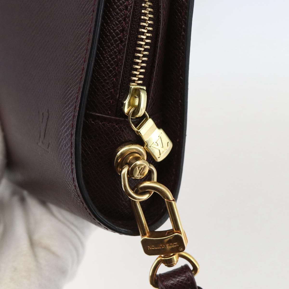 Louis Vuitton Pochette Baikal Clutch Taiga Leather Brown Leather Clutche & Pouche Bag (Pre-Owned)