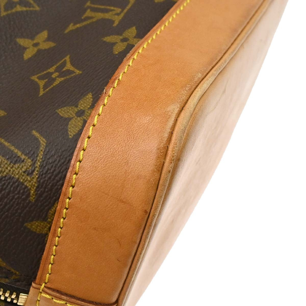 Louis Vuitton Alma Handbag Monogram Canvas Brown Canvas Handbag (Pre-Owned)