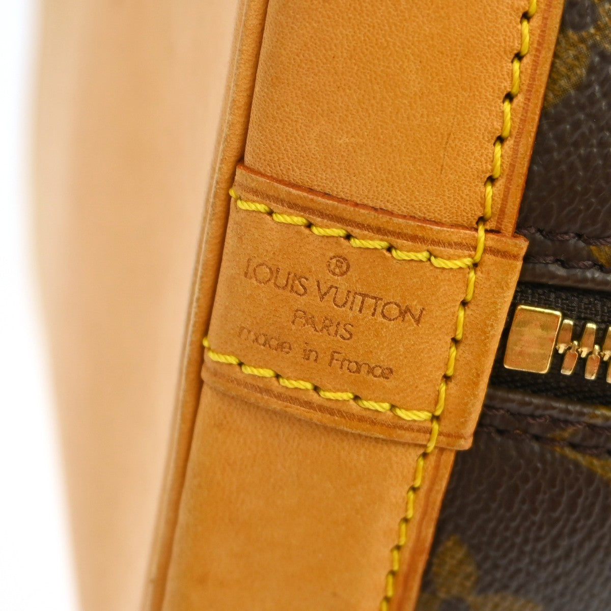 Louis Vuitton Alma Handbag Monogram Canvas Brown Canvas Handbag (Pre-Owned)