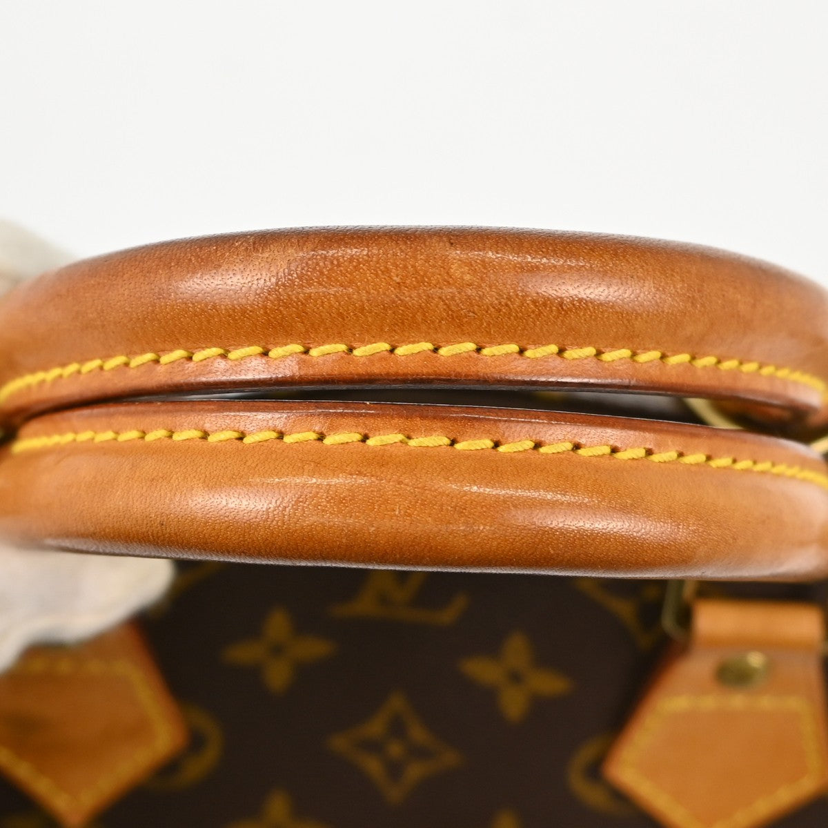 Louis Vuitton Alma Handbag Monogram Canvas Brown Canvas Handbag (Pre-Owned)