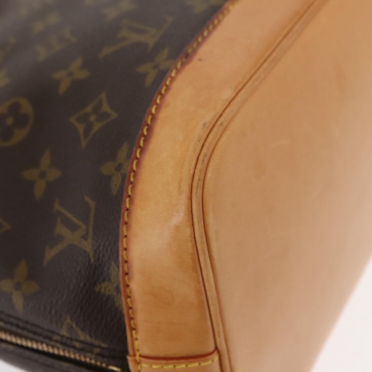 Louis Vuitton Alma Handbag Monogram Canvas Brown Canvas Handbag (Pre-Owned)