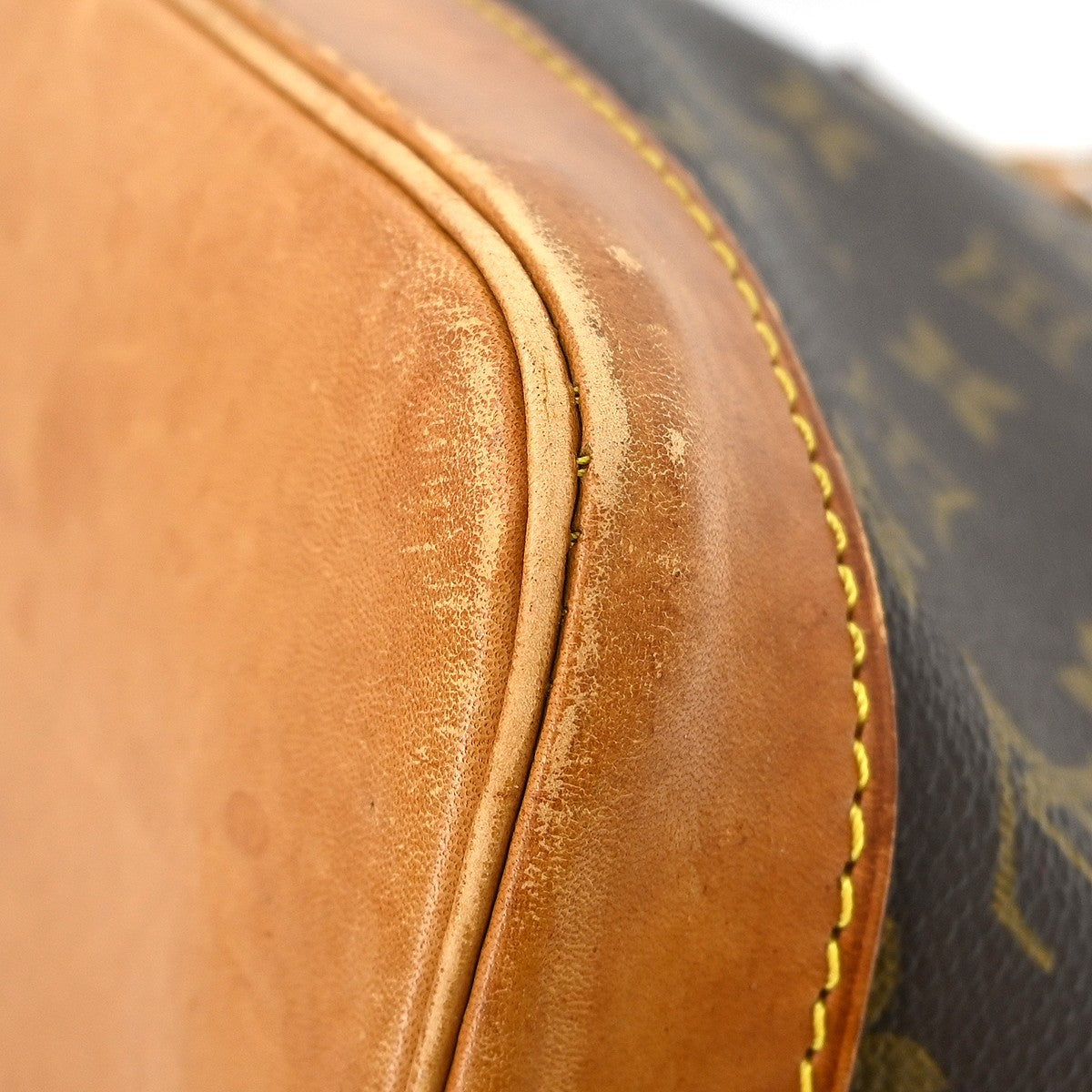Louis Vuitton Alma Handbag Monogram Canvas Brown Canvas Handbag (Pre-Owned)