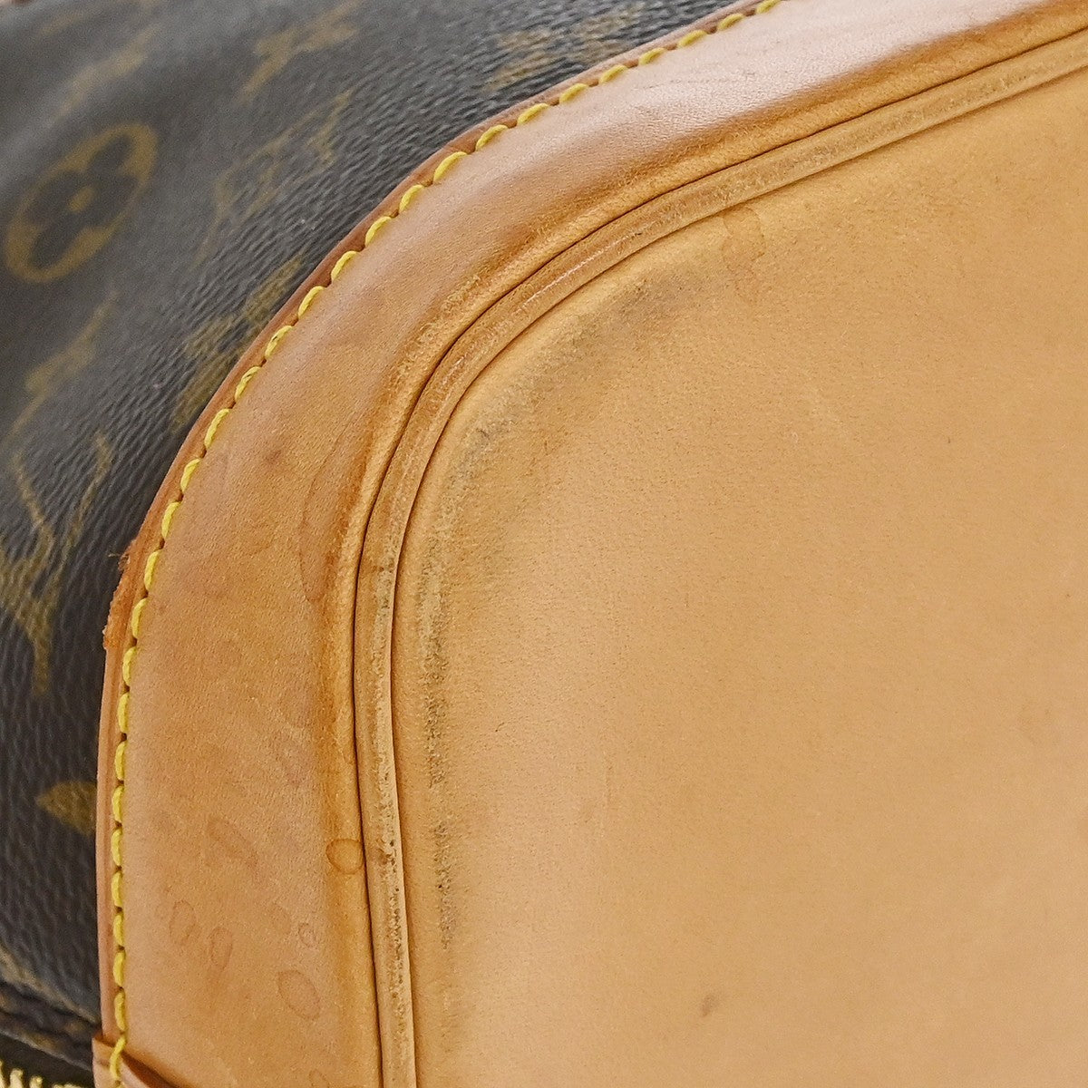 Louis Vuitton Alma Handbag Monogram Canvas Brown Canvas Handbag (Pre-Owned)