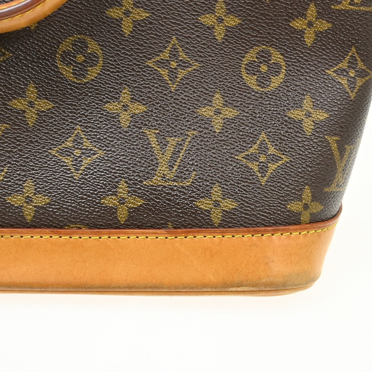 Louis Vuitton Alma Handbag Monogram Canvas Brown Canvas Handbag (Pre-Owned)