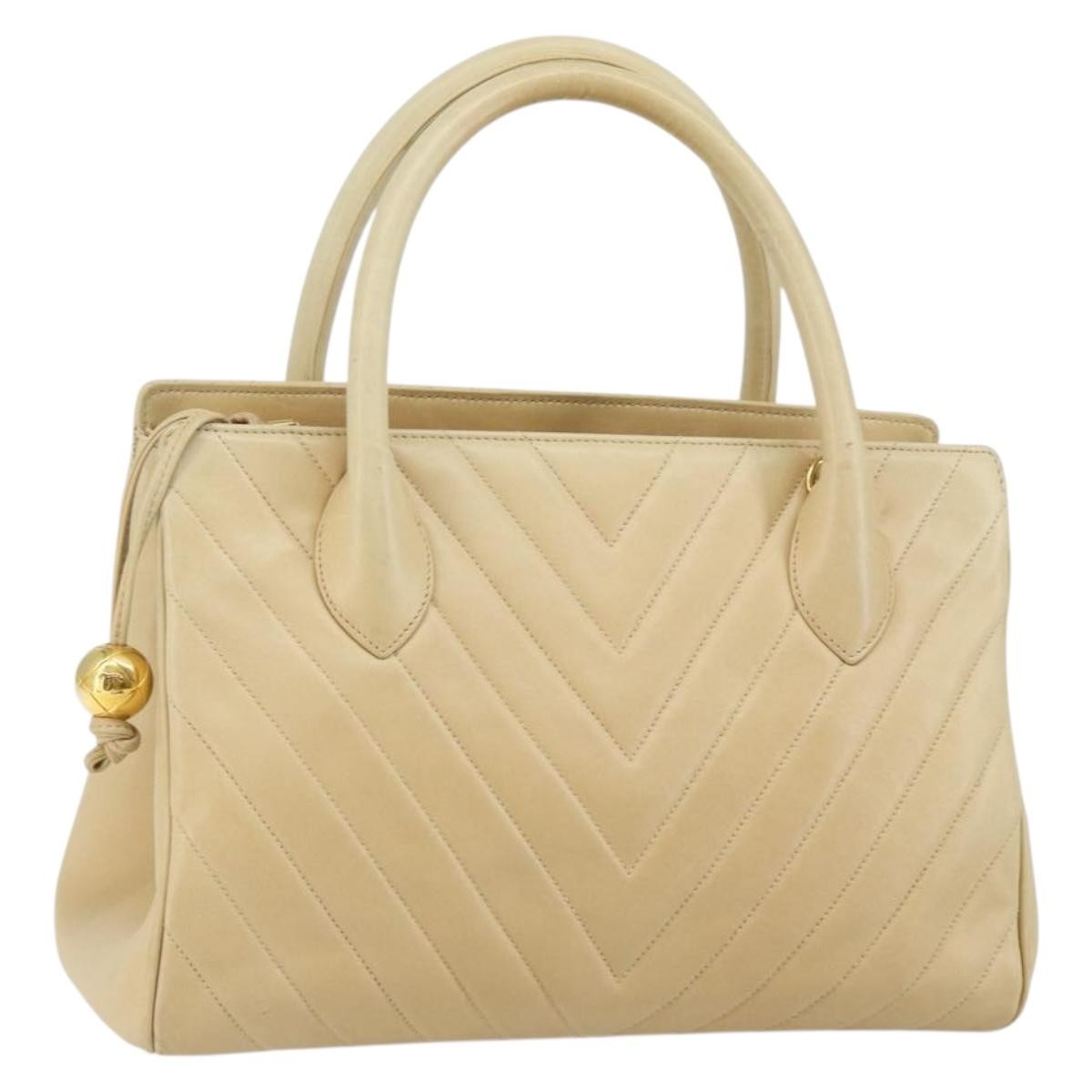 Chanel V Stitch Leather Beige Leather Handbag (Pre-Owned)